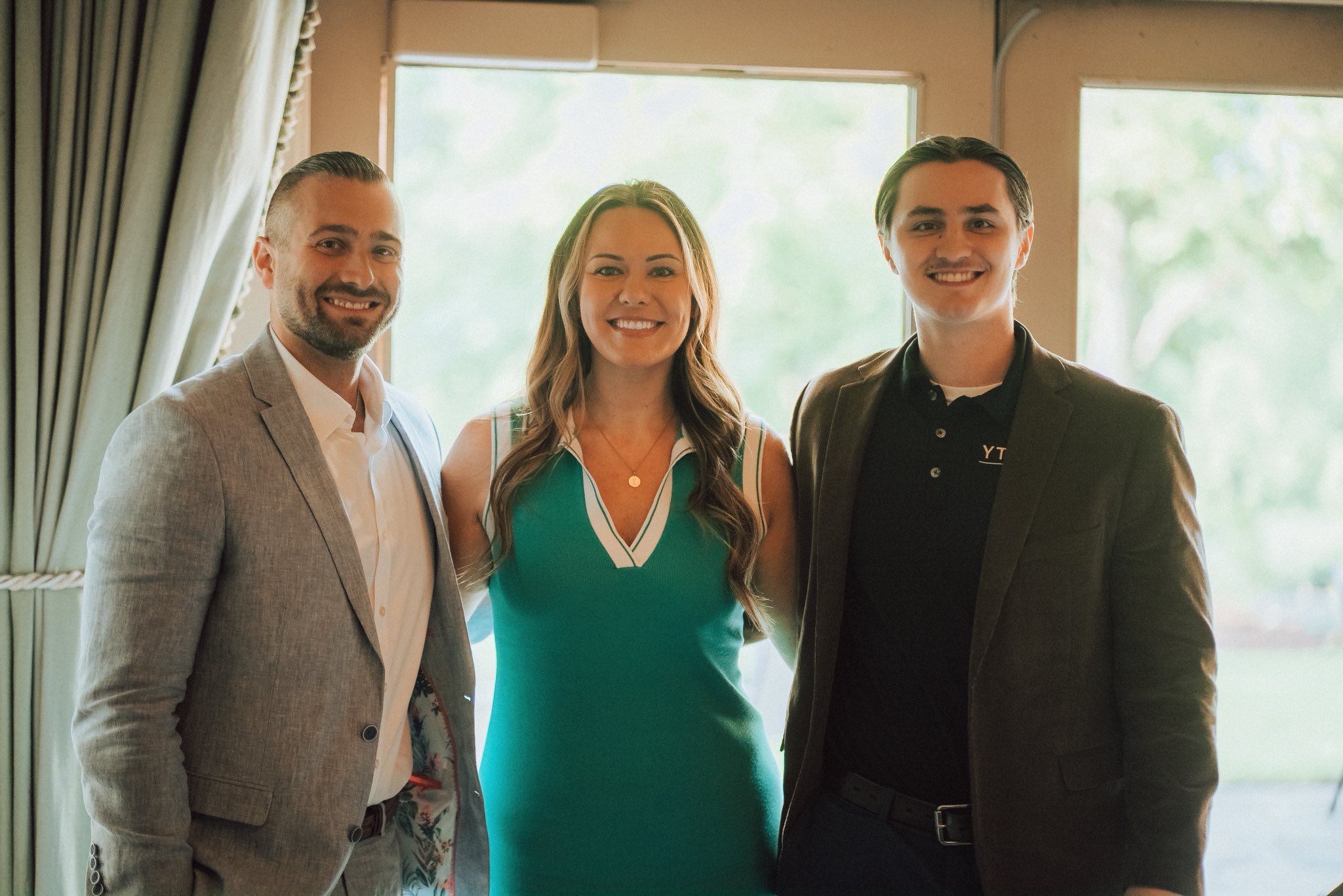 three members of the YTS team at the YTS Mid-Year Kickoff