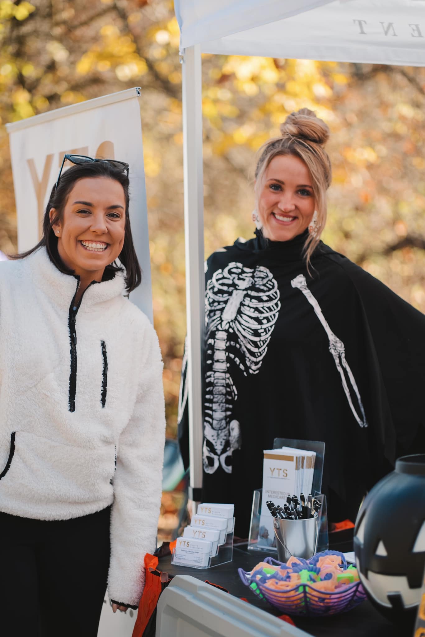 YTS team members Gabby Viragova and Marli McCullough at the Trick or Treat on the Trail 2024 event