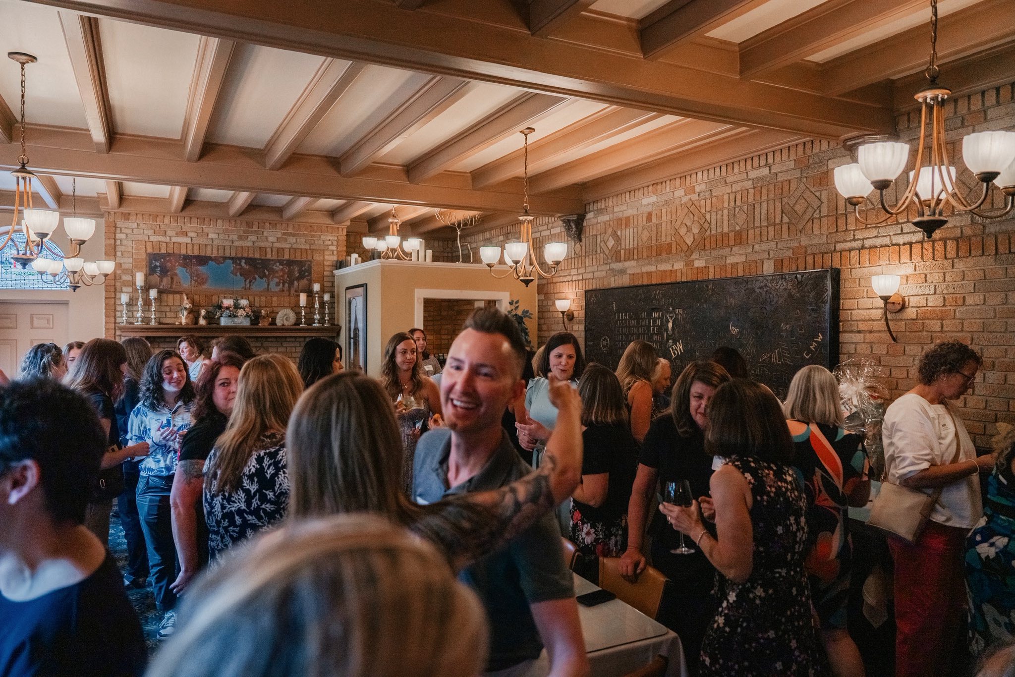 the interior of J. Corks showing the crowd at the Women of Westmoreland networking event