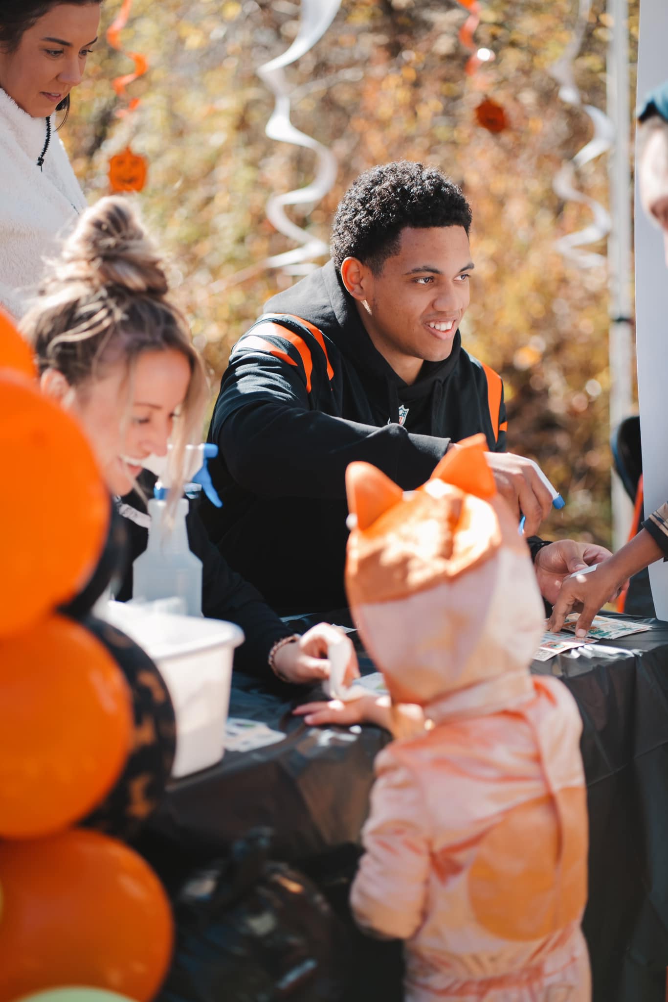 YTS team members pass out treats at the Trick or Treat on the Trail 2024 event