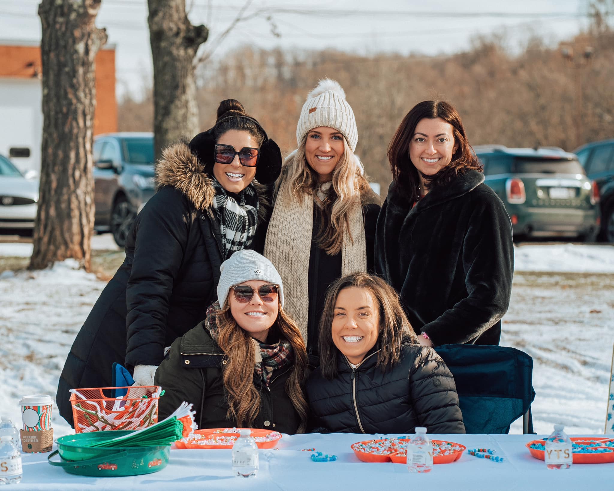 members of the YTS team in the YTS booth at the Santa at Sardis holiday event
