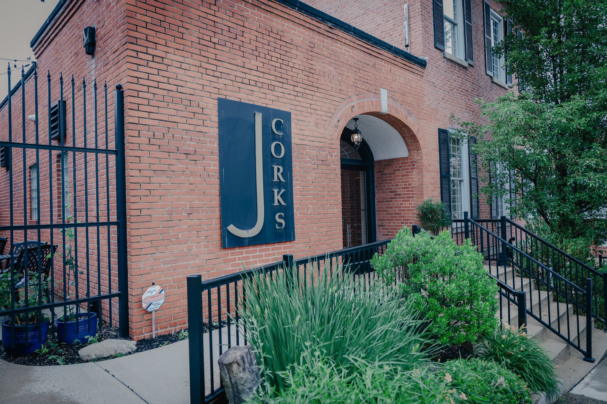 the exterior front facade of J. Corks