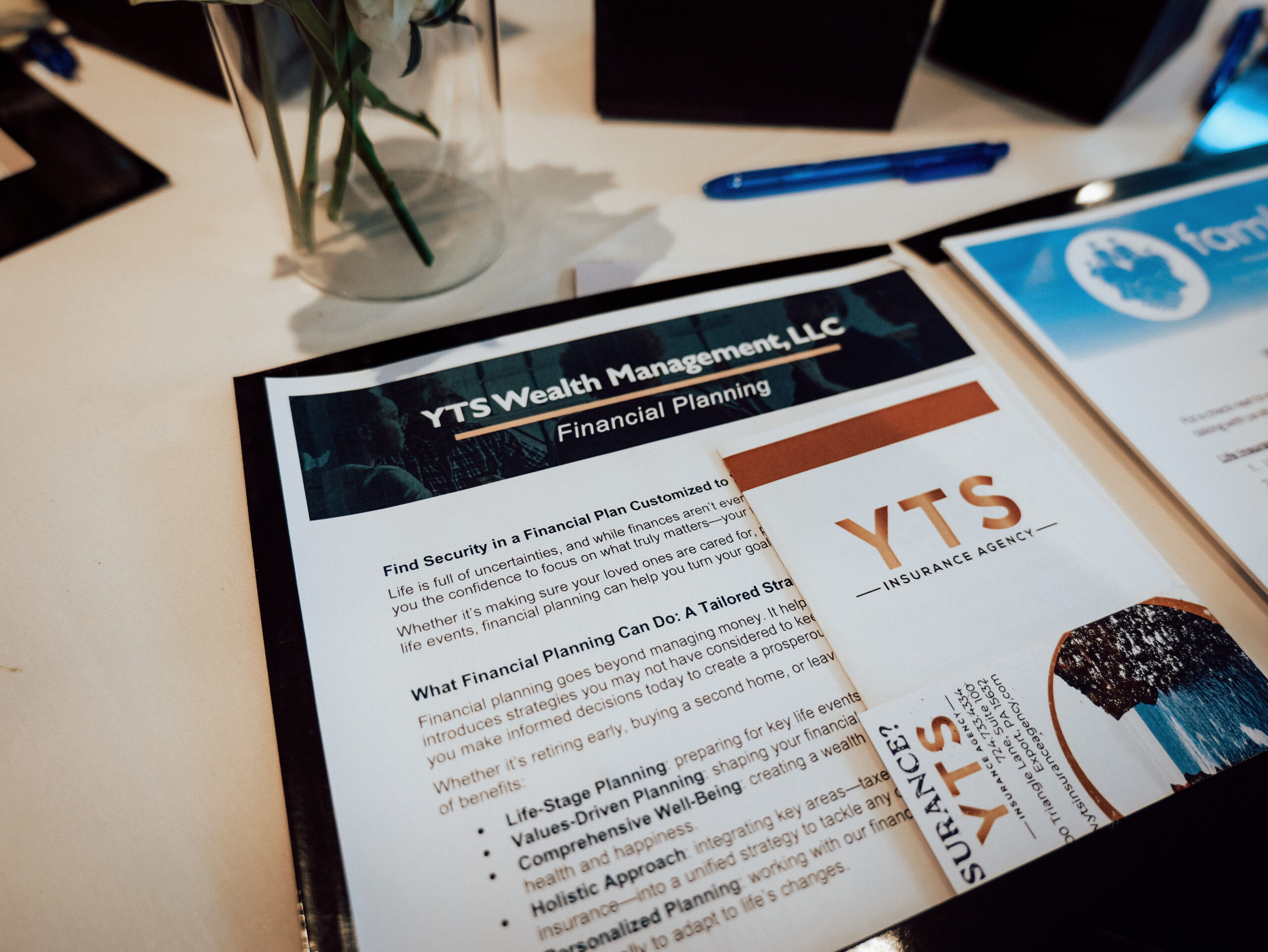 YTS Wealth Management information on a table at the AWE Women’s Business Summit