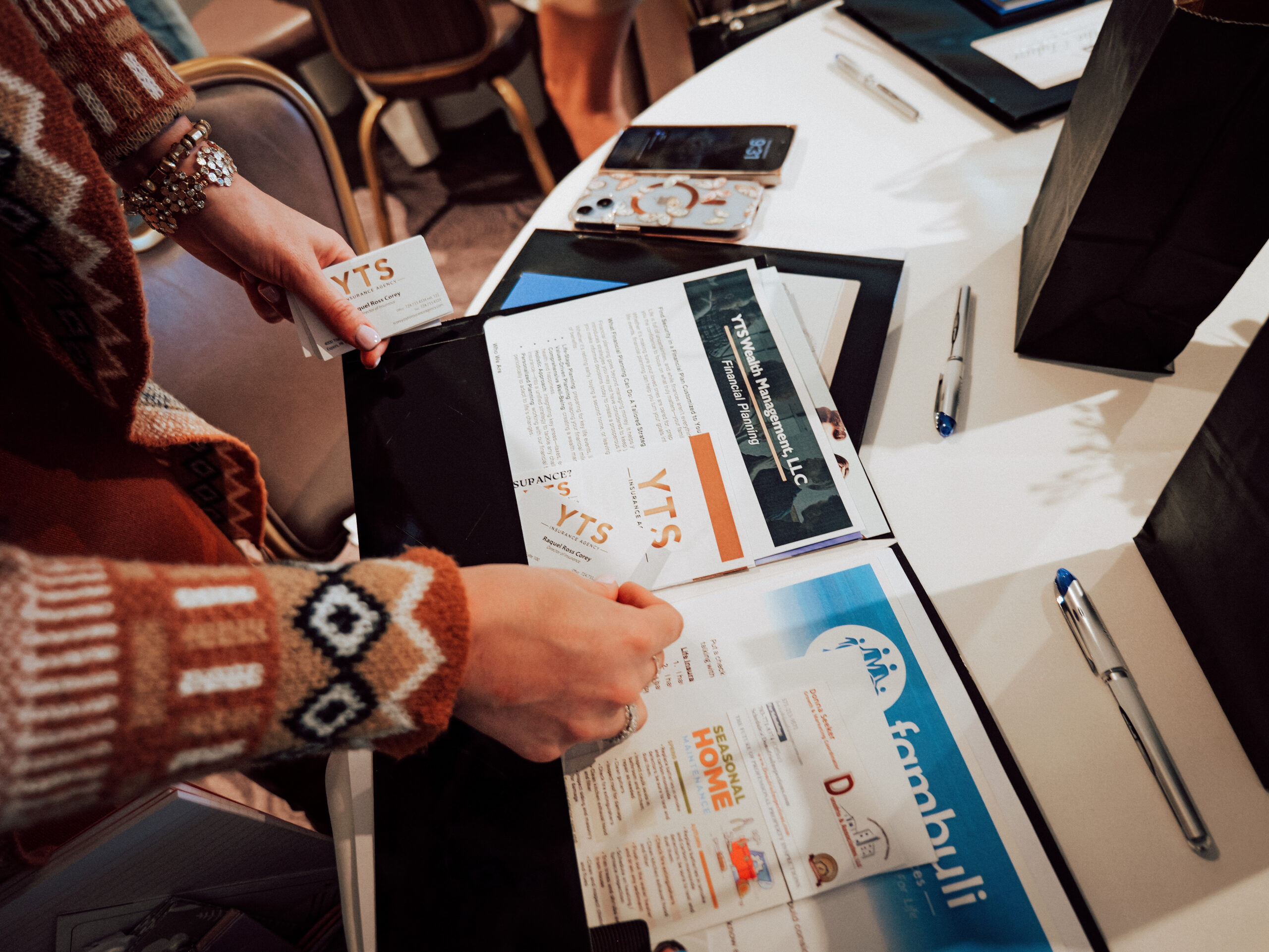 YTS Wealth Management information on a table at the AWE Women’s Business Summit