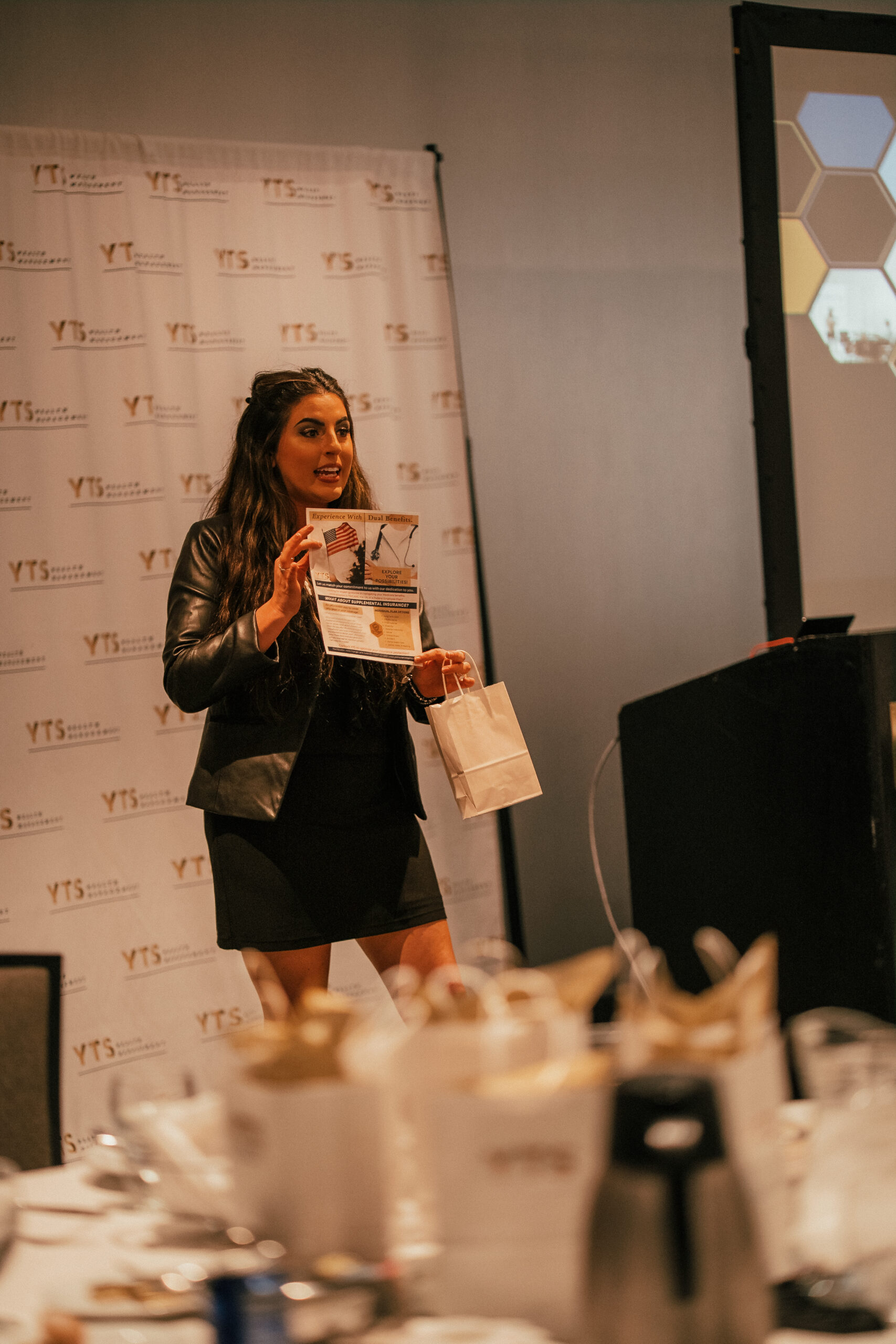 YTS Director of Insurance, Raquel Corey, speaks at the Arlington Financial Planning Seminar