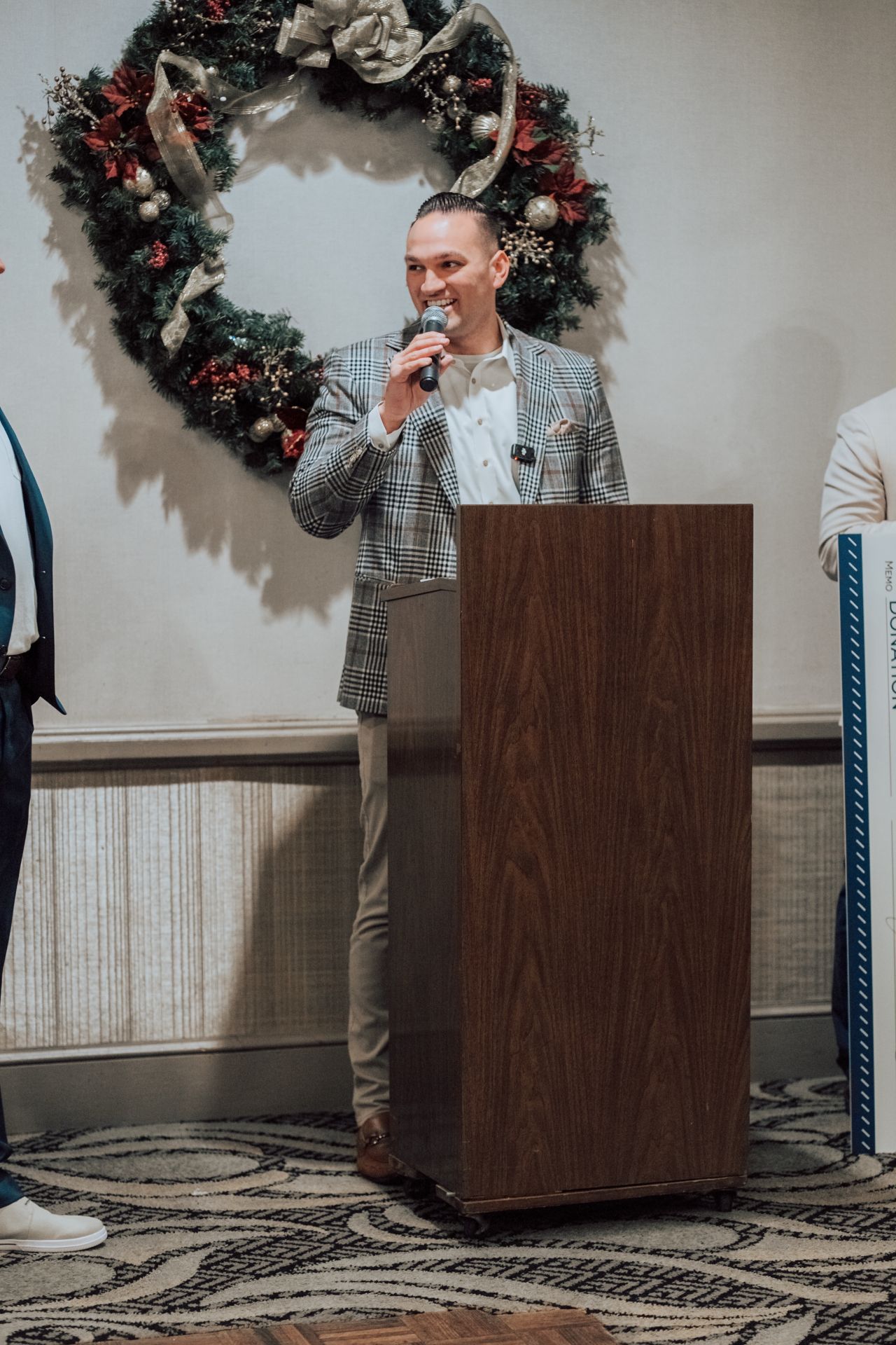 YTS President and CEO Nick Subich speaks before presenting a check to the Franklin Regional High School Football Boosters