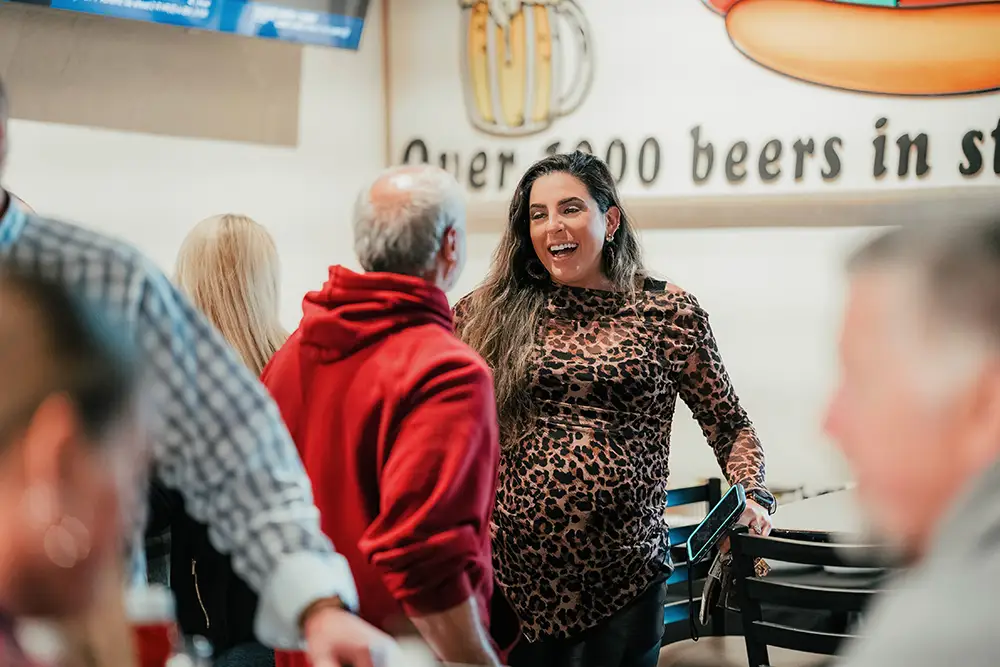 Happy hour event at D’s Six Packs & Dogs