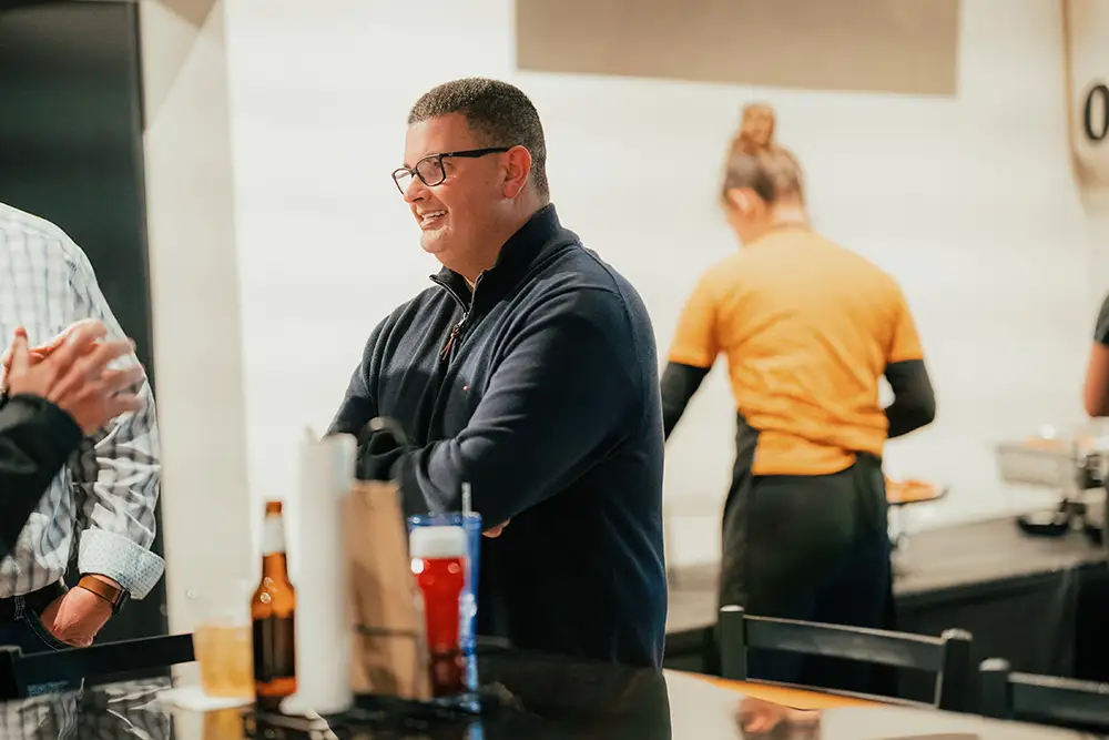 Happy hour event at D’s Six Packs & Dogs